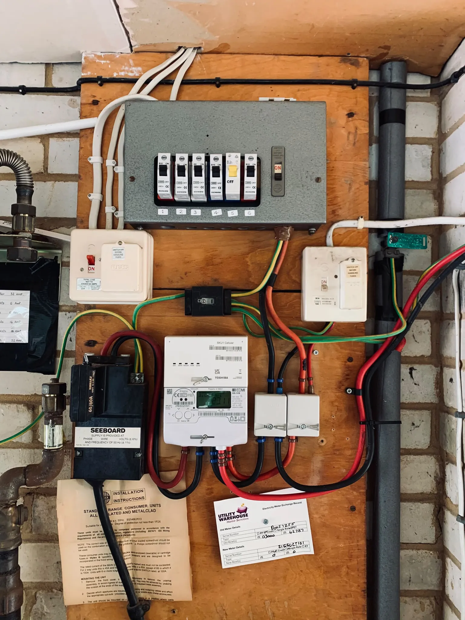 Existing consumer unit and metering equipment before replacement